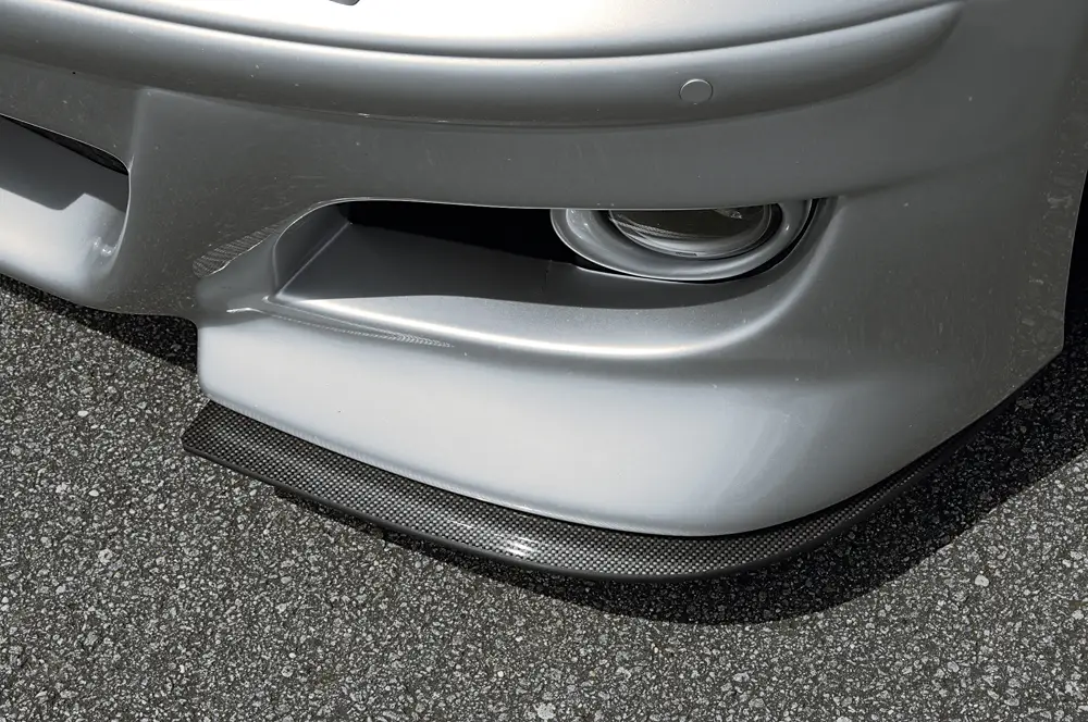 Originální Rieger lipa pod přední nárazník pro BMW řada 1 E87 sedan před faceliftem, 09/04-03/07, plast ABS s povrchovou úpravou Carbon-Look