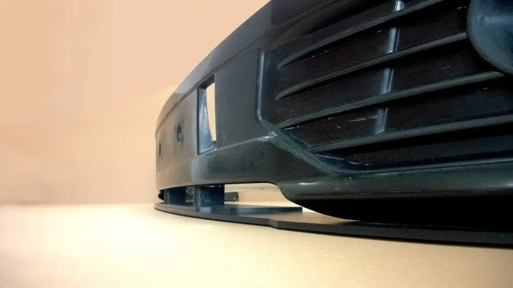 Aktuální Maxton Design "Racing" spoiler pod přední nárazník pro Volkswagen T5, plast ABS bez povrchové úpravy